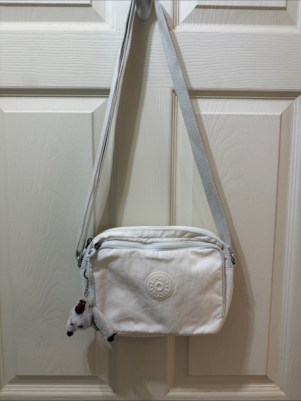 Kipling White Crossbody Bag with Plush Monkey Charm